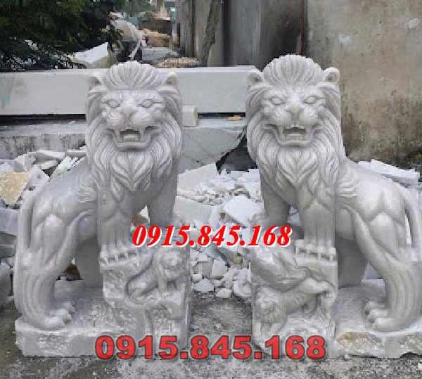 Mẫu-20 kỳ lân sư tử đá nghê kiên giang 11 watermarked su tu da cam thach trang tu nhien nguyen khoi 600x539 1