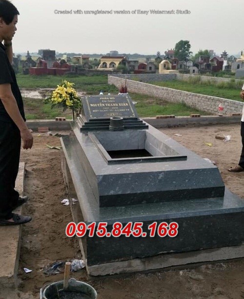 29+Mẫu mộ tam cấp đá xanh bình phước 9 watermarked z2395671453156 8073234b9f604953a19ff451a4214674 Copy 2